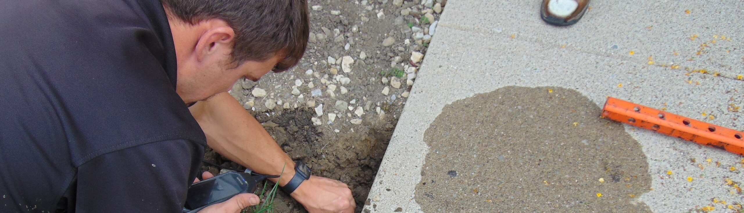 SmartLevel Concrete | Case Studies | Employee Repairing Concrete