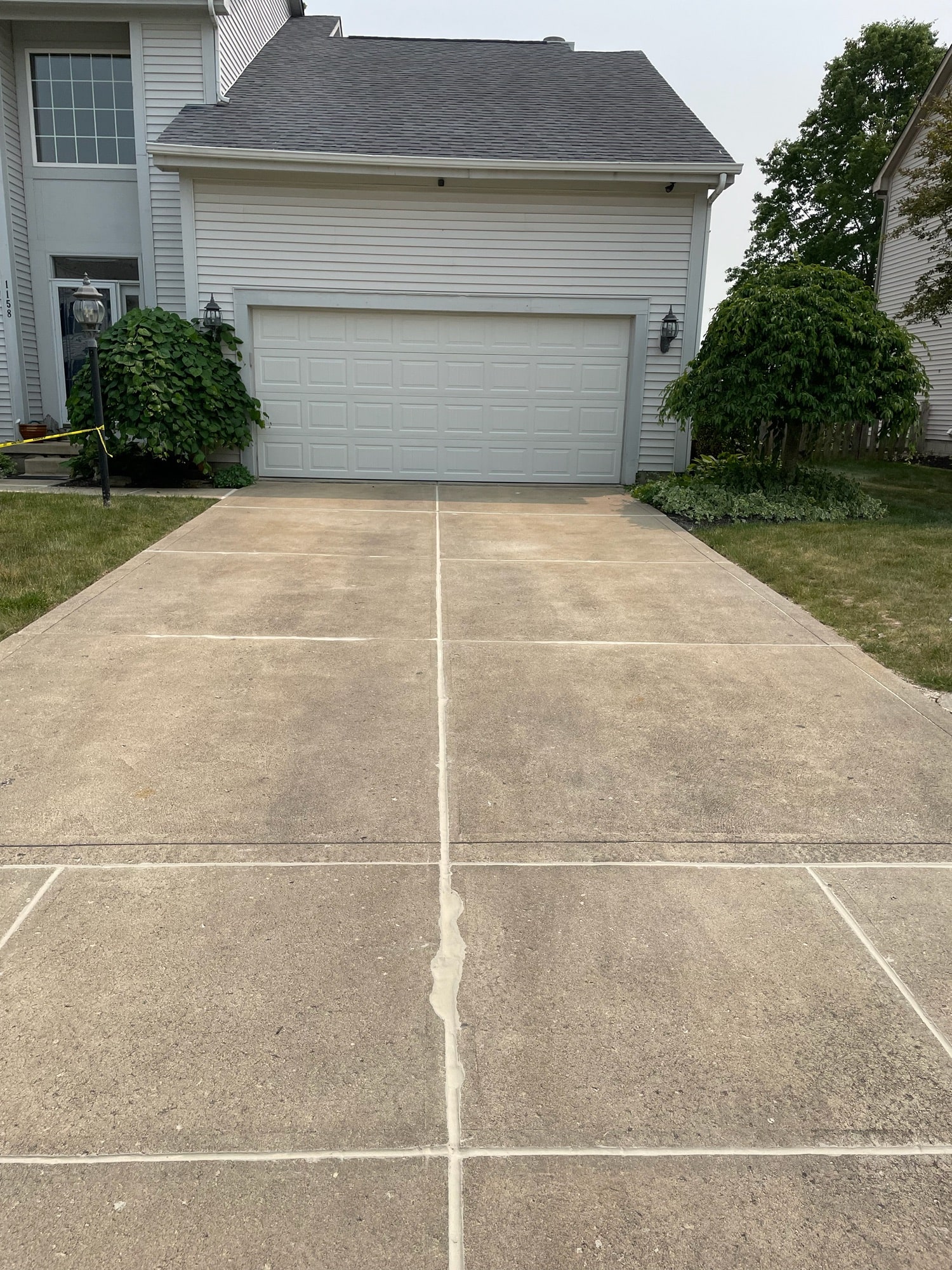 Even Driveway | SmartLevel | Before Concrete Leveling | Driveway Repair