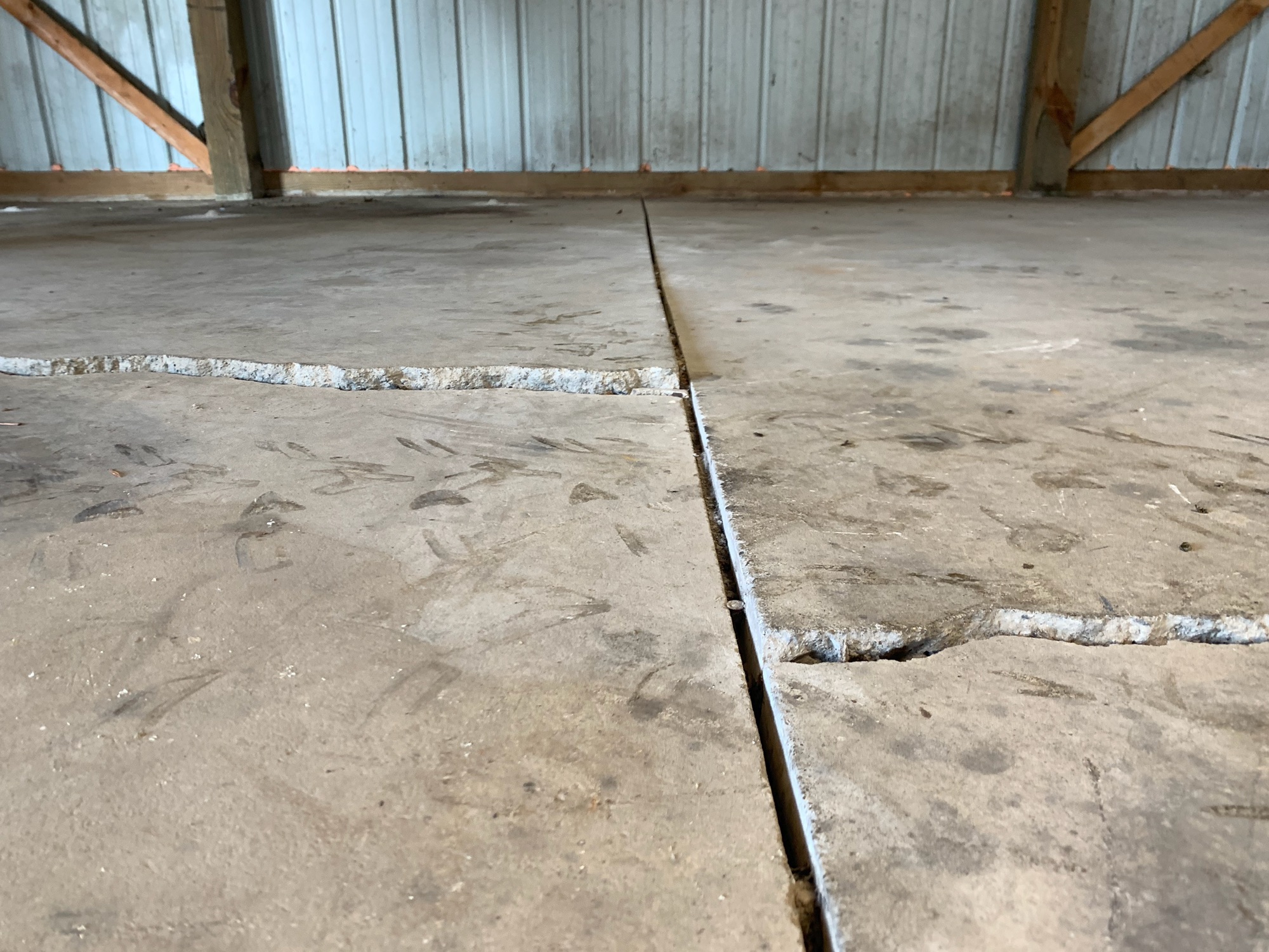 SmartLevel Concrete | Uneven Interior Slab | Before Concrete Repair